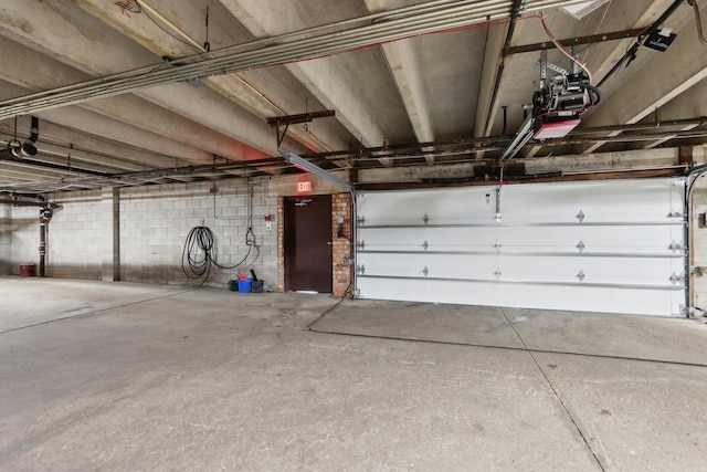 parking garage featuring concrete block wall