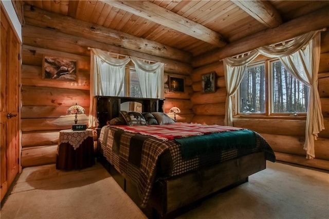 6306W Hunter Lake Rd, Winter, WI 54896 - bedroom with wooden ceiling, beam ceiling, and light colored carpet