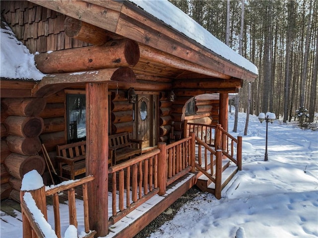 view of snow covered deck