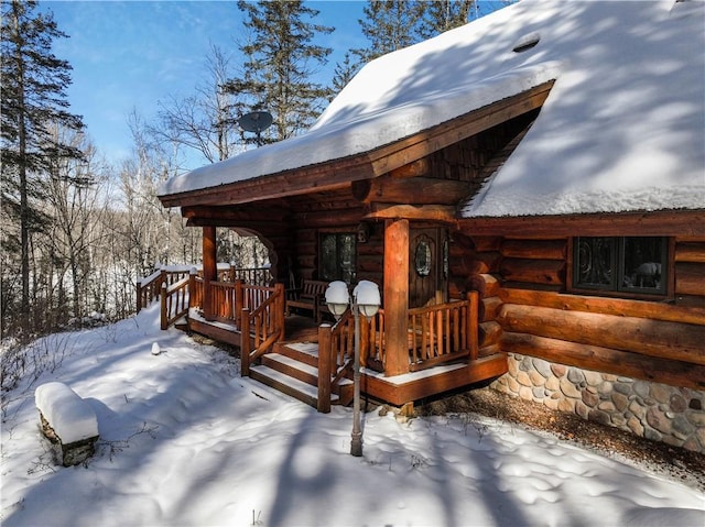 6306W Hunter Lake Rd, Winter, WI 54896 - view of snow covered deck