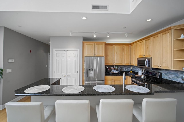 kitchen with open shelves, tasteful backsplash, visible vents, appliances with stainless steel finishes, and dark stone counters