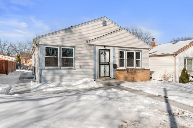 view of front of home with fence