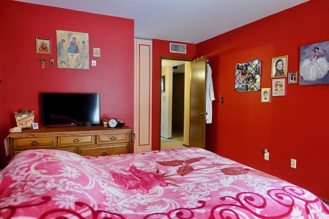 bedroom with visible vents