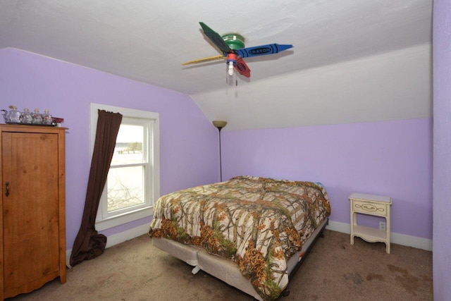 14034 58th Rd, Sturtevant, WI 53177 - carpeted bedroom with vaulted ceiling, a ceiling fan, and baseboards