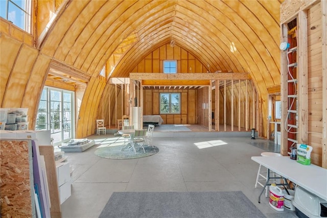 interior space featuring high vaulted ceiling