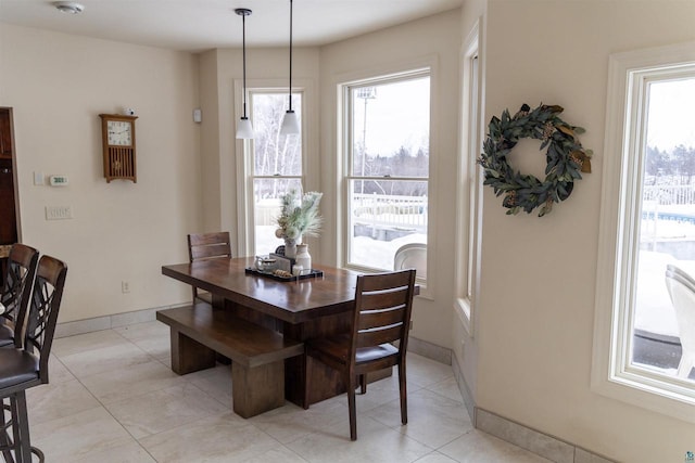7926 S County Rd A, Superior, WI 54880 - dining space featuring light tile patterned floors
