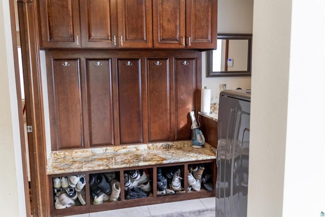 7926 S County Rd A, Superior, WI 54880 - mudroom featuring washer / clothes dryer and light tile patterned flooring