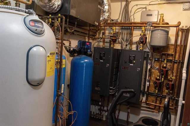 7926 S County Rd A, Superior, WI 54880 - utility room featuring electric water heater