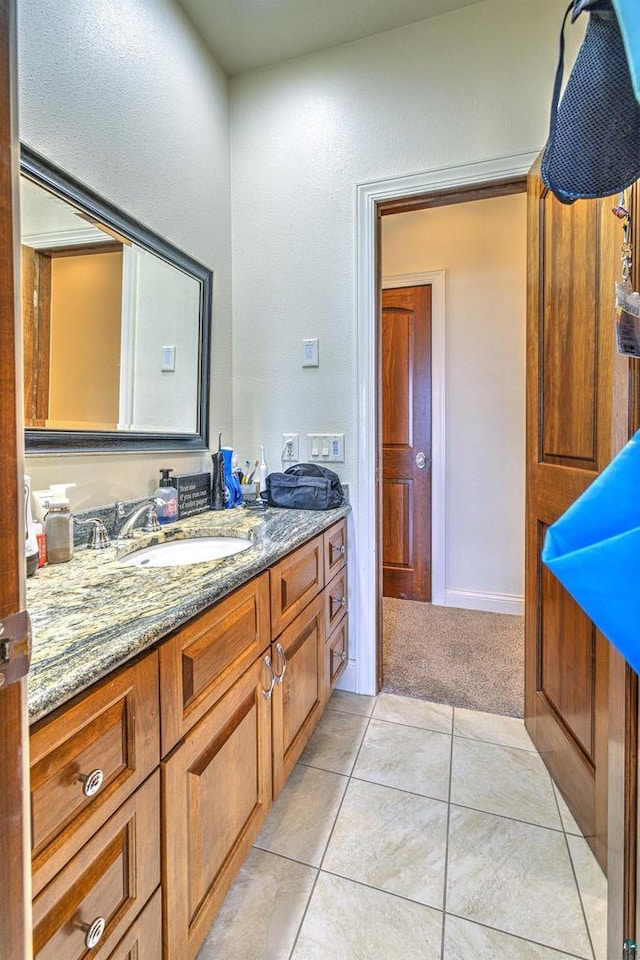 7926 S County Rd A, Superior, WI 54880 - bathroom with vanity and tile patterned floors
