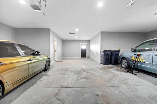 parking deck featuring a garage door opener