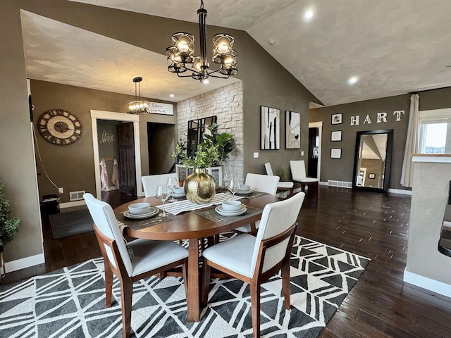 dining room with hardwood / wood-style flooring, a notable chandelier, visible vents, baseboards, and vaulted ceiling