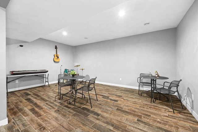 dining area featuring recessed lighting, wood finished floors, and baseboards