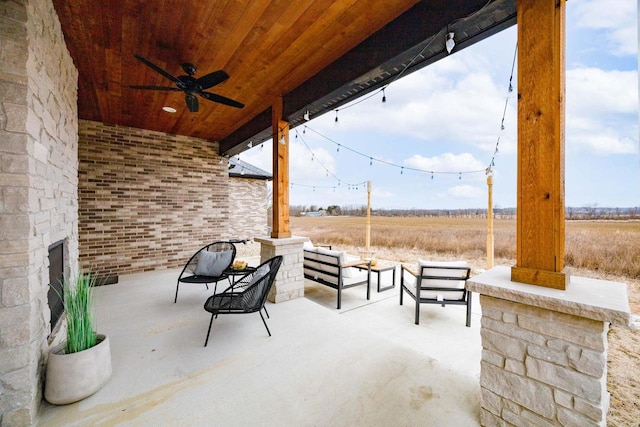 view of patio / terrace featuring a ceiling fan