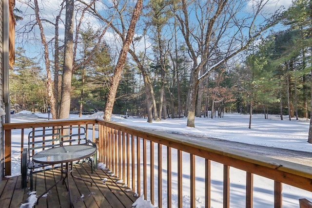 view of snow covered deck