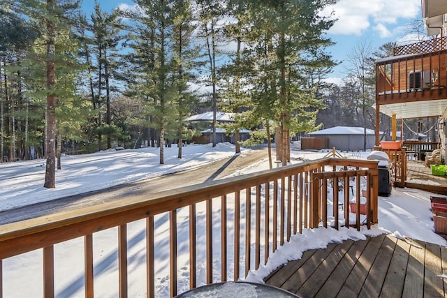 view of snow covered deck