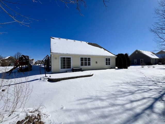 view of snow covered house