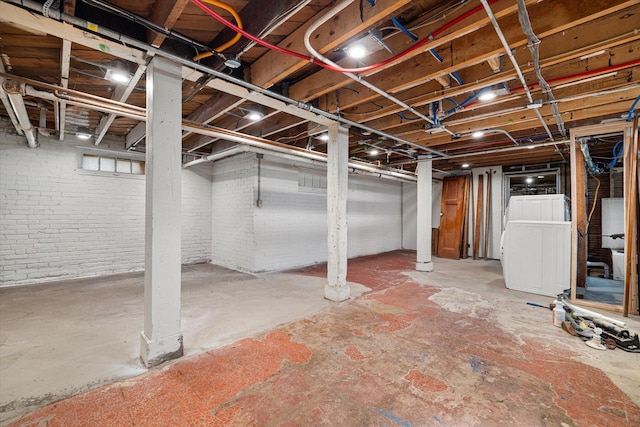 unfinished basement with brick wall