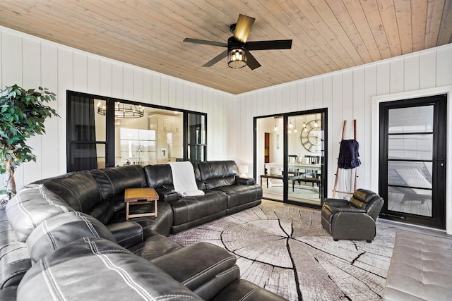 living room with wooden ceiling and ceiling fan