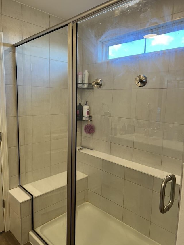 full bath featuring a stall shower