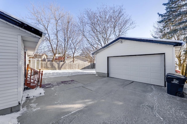 garage with fence