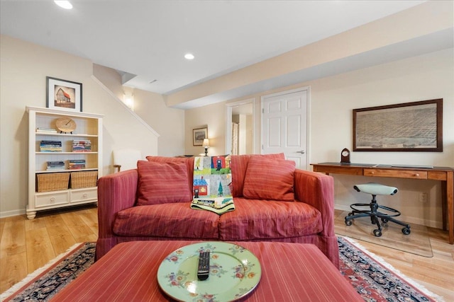 living room featuring hardwood / wood-style floors and recessed lighting