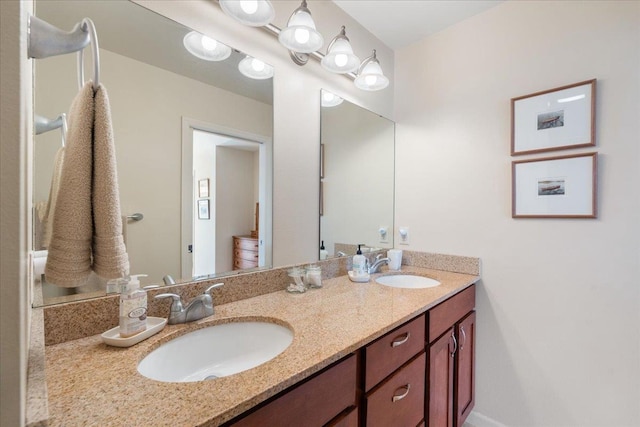 full bath with double vanity and a sink