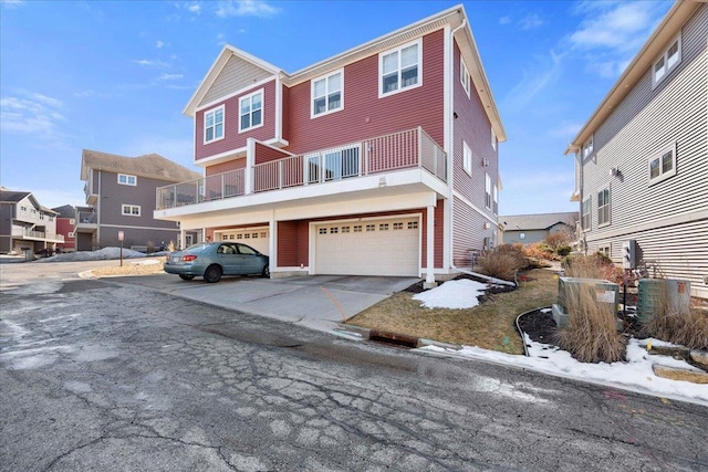 view of front of home featuring driveway and an attached garage