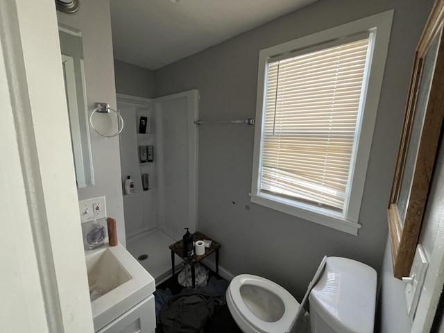 full bathroom with vanity and toilet