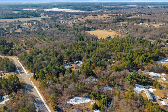 bird's eye view featuring a view of trees