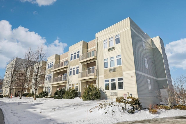 view of snow covered property