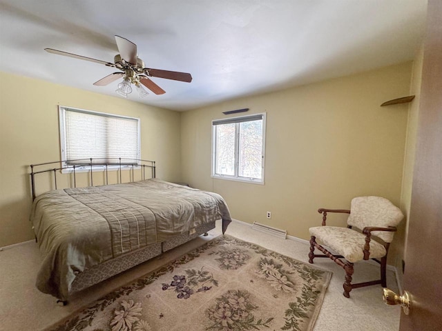 bedroom with carpet, baseboards, and ceiling fan