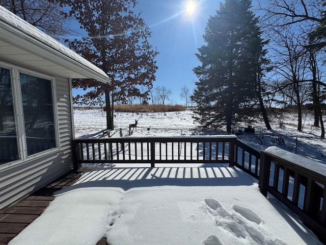 view of snow covered deck