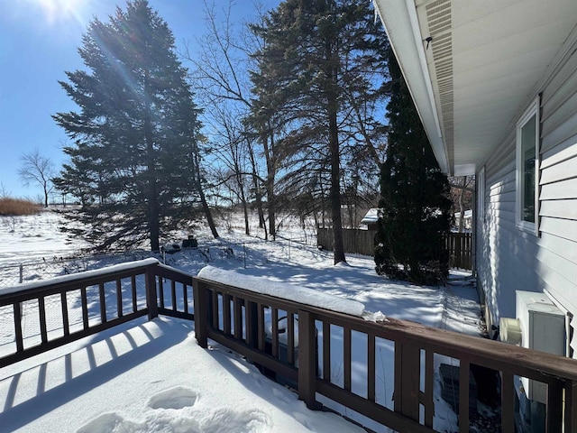 view of snow covered deck