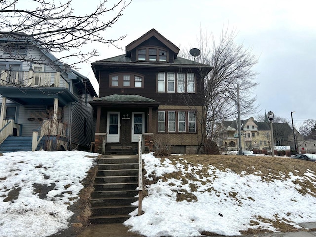 american foursquare style home with stairway