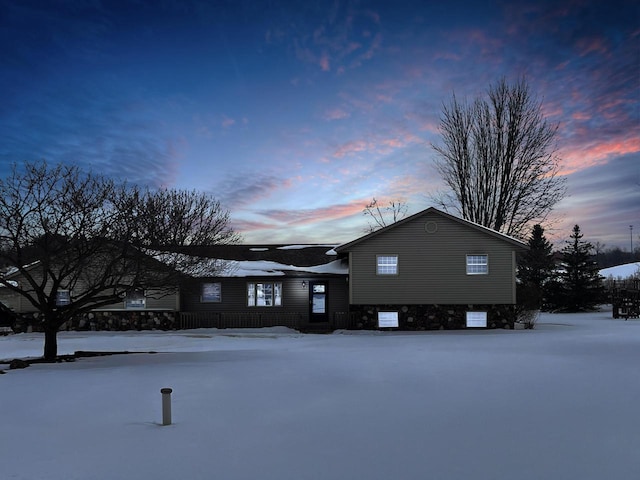 view of front of home featuring stone siding