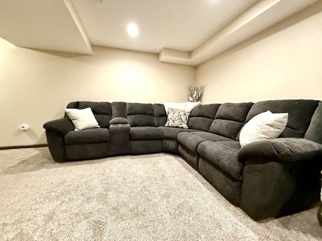 living area with carpet floors and baseboards