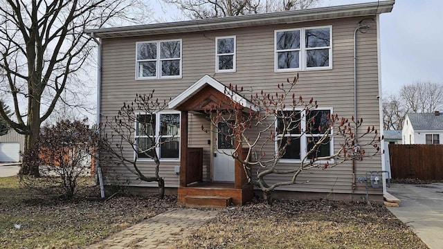 view of front of home with fence