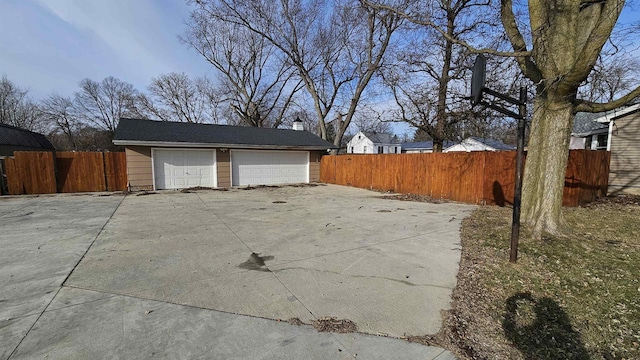 detached garage with fence