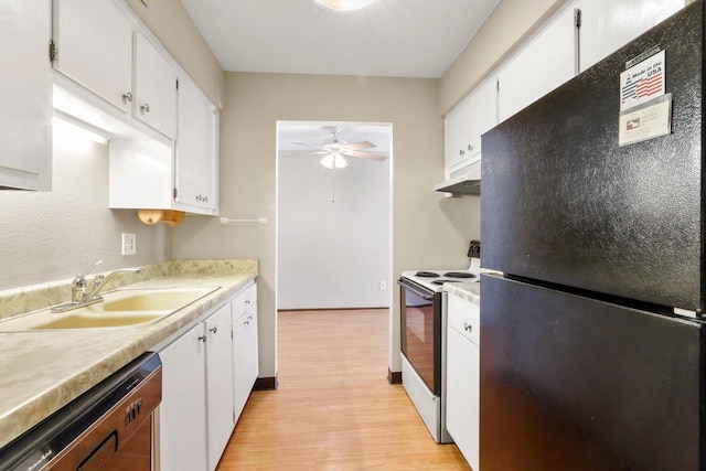 kitchen featuring black appliances, under cabinet range hood, white cabinets, and light countertops