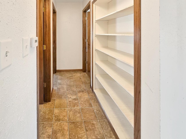 hallway with baseboards