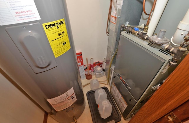 utility room with water heater