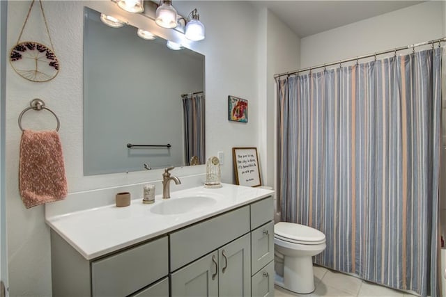 full bath featuring toilet, a shower with curtain, vanity, and tile patterned floors