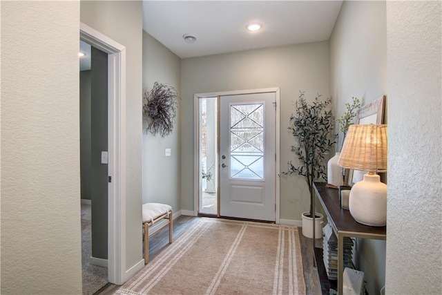 entrance foyer featuring baseboards