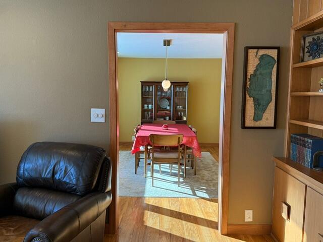 dining room with wood finished floors