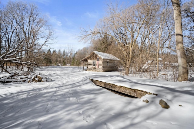 view of yard covered in snow