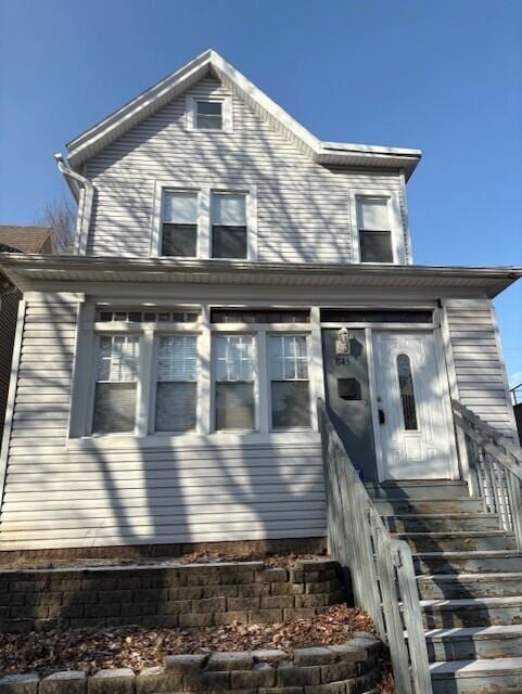 view of front of property with entry steps