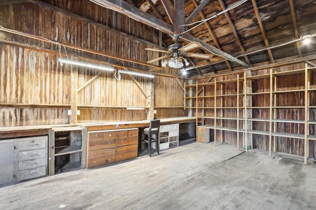 interior space featuring ceiling fan