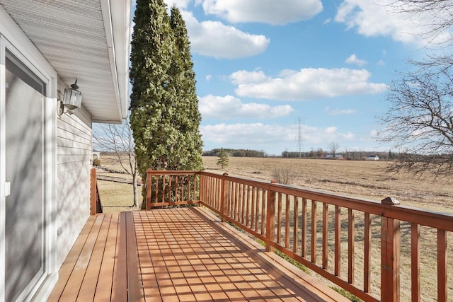 wooden terrace with a rural view