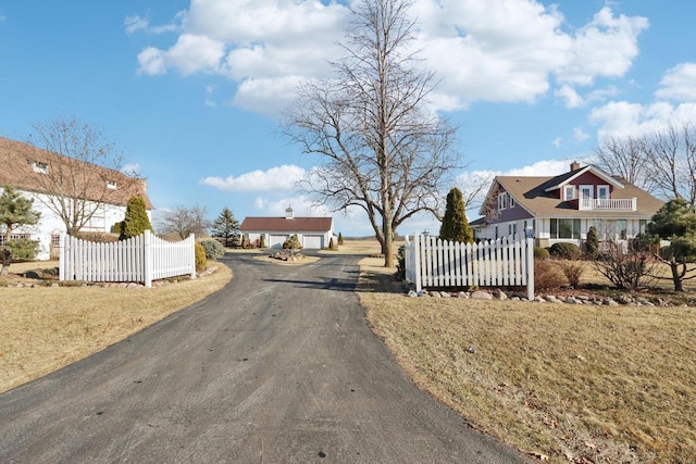 view of road with driveway