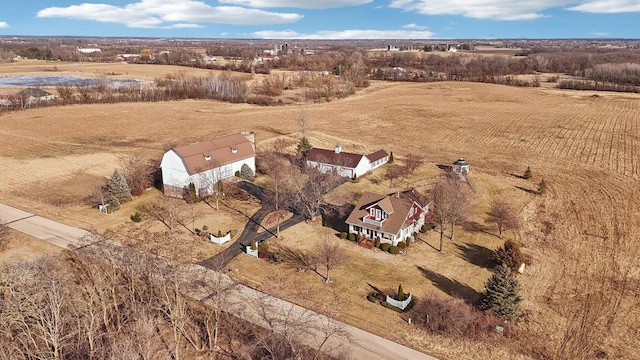 birds eye view of property featuring a rural view